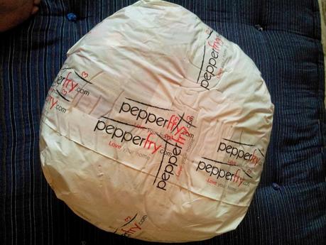 Cushions were packed with a plastic wrap with Pepperfry logo on. Pepperfry team should be a little alert or what could happen while product is out for shipping.