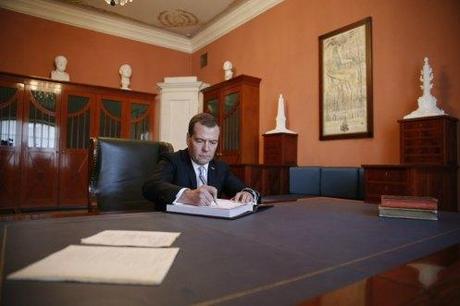 Sitting at Derzhavin's desk, PM Medvedev signed the Museum guest book.