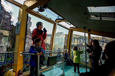 Scenicworld's Cableway cable car takes visitors through hanging swamps and lush mountain rainforests to climb up sheer rock faces with spectacular views of Katoomba Falls and the Jamison valley. Photo: Blue Mountains Lithgow & Oberon Tourism. Image by David Hill.