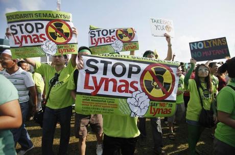 (Photo: REUTERS / ) Opponents to the controversial Lynas rare earths processing plant in Malaysia now clamored for the resignation of the four ministers who approved the awarding of the temporary operating license (TOL) to Australian miner Lynas Corp, after the latter denied the existence of a provision in its license which states that the plant's residue must be shipped out of Malaysia.