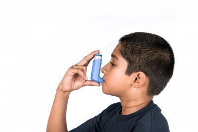 Child using asthma inhaler. Image courtesy of Arvind Balaraman / FreeDigitalPhotos.net