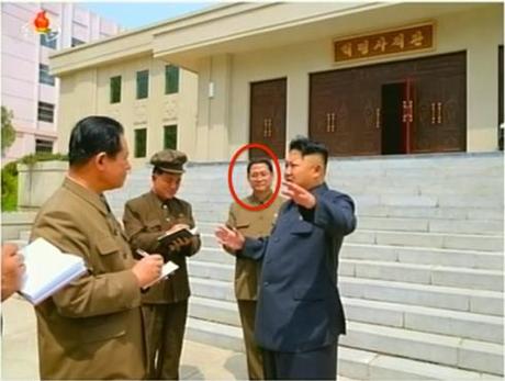 Pak Thae Song (Pak T'ae-so'ng), circled, deputy director of the WPK Organization Guidance Department, attends Kim Jong Un's May 2014 visit to the January 18 General Machinery Plant (Photo: KCTV).