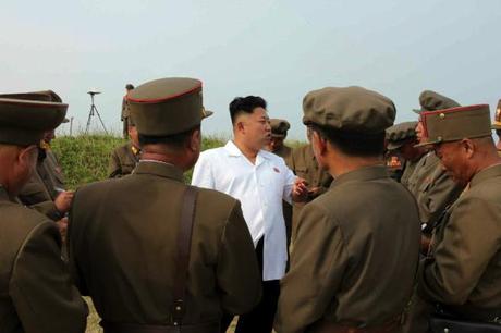 Kim Jong Un speaks to KPA and WPK munitions industry officials after a missile test flight held on or around 26 June 2014 (Photo: Rodong Sinmun).