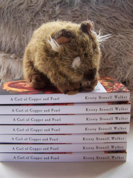 A Curl of Copper and Pearl: An Extract for Wombat Friday