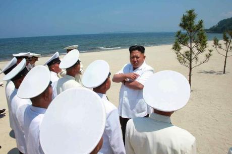 Kim Jong Un speaks to KPA Navy commanding officers at an assessment of their swimming abilities (Photo: Rodong Sinmun).