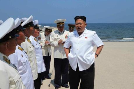 Kim Jong Un talks with KPA Navy commanding officers prior to an assessment of their swimming abilities (Photo: Rodong Sinmun).