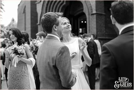 Funny candid wedding photography of bride making silly face