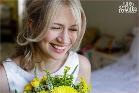 Bride laughs wedding photography