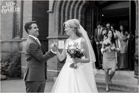 bride and groom fist bump funny wedding photography