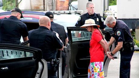 Jane Palmer of Monkton, Vt., was arrested after refusing to leave the Vermont Gas Systems headquarters in South Burlington on Wednesday. She and four other women were knitting in protest of a planned pipeline. Taylor Dobbs/Vermont Public Radio