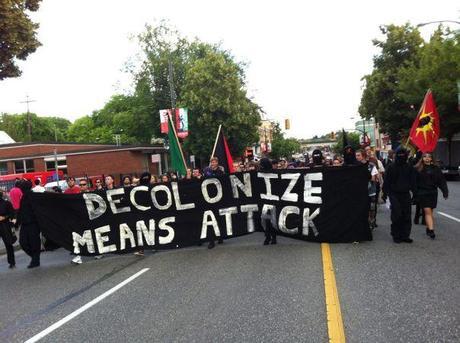 Confronting Canada Day march down Commercial Drive, July 1, 2014.