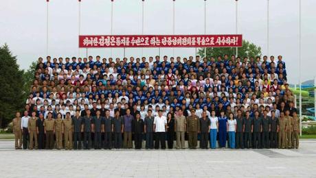 Kim Jong Un poses for a commemorative photograph with managers, teachers, functionaries and other employees of Songdowon International Children's Camp (Photo: Rodong Sinmun).