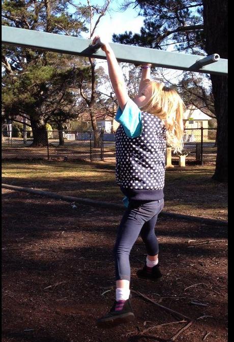 Look at me, I can do the monkey bars all by myself. How clever is she!
