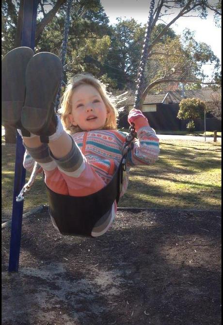 Swinging is fun! I am doing it all by myself now mummy!