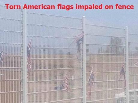 torn up American flags on Murietta fence