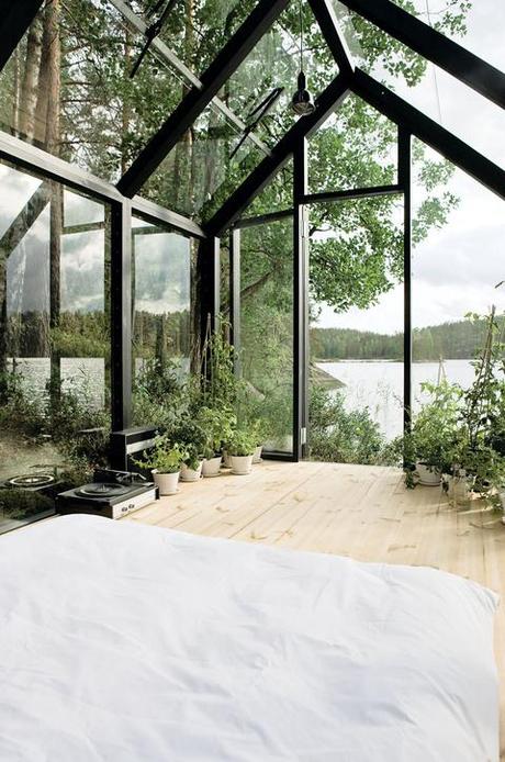 Prefab bedroom with wood frame and glass walls and ceiling