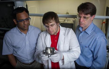 Georgia Tech professors Sankar Nair (left) and Christopher Jones (right), with graduate student Andrew Brown, who led the membrane fabrication work and holds a metal-organic framework (MOF) membrane module. 