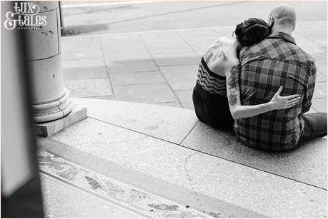 Akternative couple cuddling on the stairs at Hyde Park Picture House