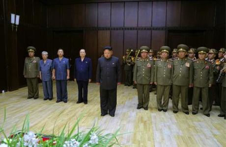 Kim Jong Un and senior officials of the Korean People's Army and the Workers' Party of Korea pay their respects in front of Jon Pyong Ho's casket in Pyongyang on 9 July 2014 (Photo: Rodong Sinmun).
