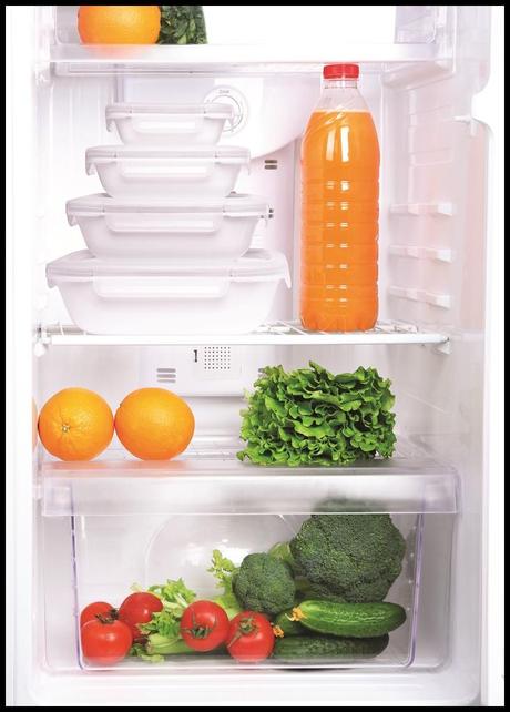 Open refrigerator with vegetarian (diet) food