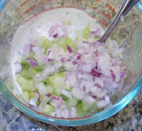 I added the veggies to the mayo and stirred to combine.  I used red onion, because I had one from my garden, and I really like it in salads.  Notice what's missing?  The olives.  I actually love olives, so I find it ironic that I keep forgetting to photograph them.