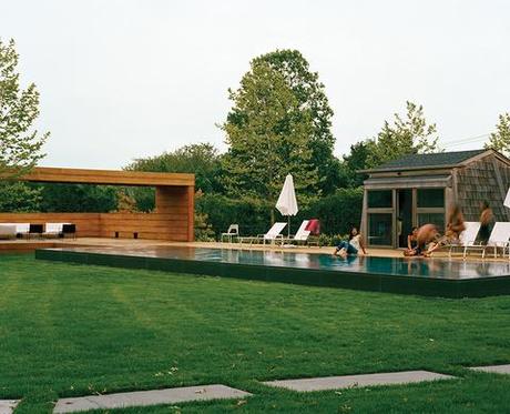 Tiny pool house by a minimal pool in Long Island