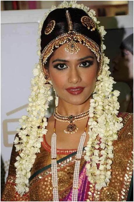 A South Indian bride all dolled out in her bridal garb. 