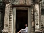 Sonya reclining in one of the doorways of the temple