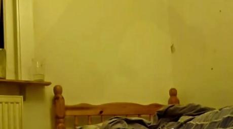 Ghost Caught On Tape Hovering Over Sleeping Man?