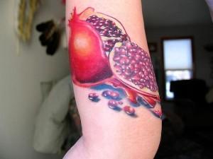 pomegranate tattoo 300x225 Top 10 Best Food Tattoos
