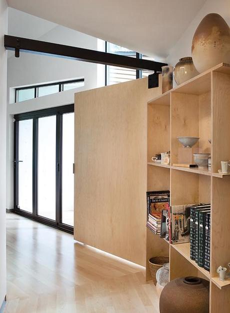 Modern addition for an Alzheimer's patient with open shelving and a wide door