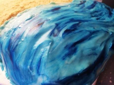 tropical blue swirled sea summer beach cake