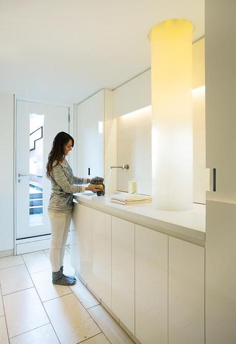 Modern laundry room with fiber-optic chute