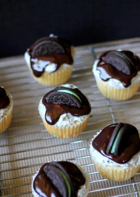 Mint Cookies & Cream Cupcakes | A vanilla cupcake with a Mint Oreo at the bottom, Mint Oreo buttercream, & chocolate ganache. #Recipe from Bakerita.com