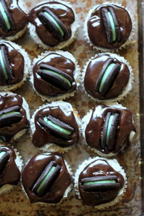 Mint Cookies & Cream Cupcakes | A vanilla cupcake with a Mint Oreo at the bottom, Mint Oreo buttercream, & chocolate ganache. #Recipe from Bakerita.com