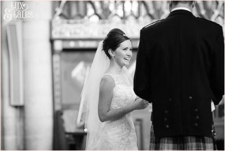 Wedding photography York Minster bride smiles at groom