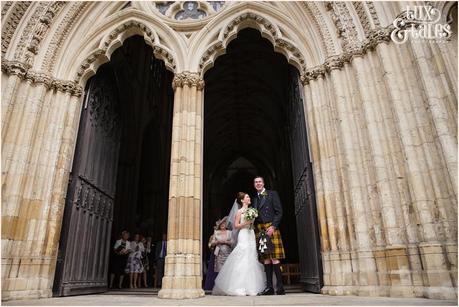 Bride & groom in entrace to York Minster