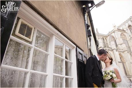 Birde & Groom Kiss with the Minster in the background York Wedding Photography