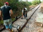 Reassembling the bamboo train after dismantle