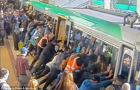 tilting train at Perth ... man saved by quick thinking of commuters
