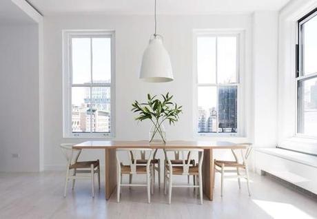 Manhattan loft apartment near Union Square by Resolution 4 Architecture with Hans Wegner chairs and wood dining table. 