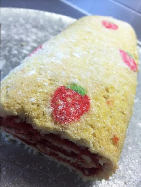 decorated strawberry swiss roll with homemade jam gbbo