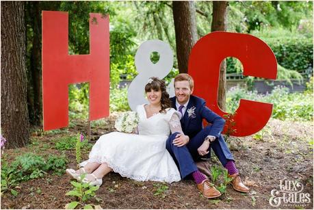 Giant letters at back garden wedding in Altrincham Tux & Tales Photography