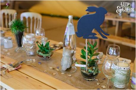 Woodland themed wedding details with rabbits owls succulents and wood at Altrincham wedding Tux & Tales Photography