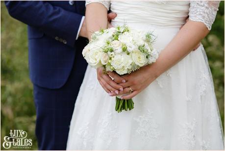 Bride holding bouquet at Altrincham wedding