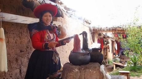 Woman in handicraft market in the Sacred Valley, Peru