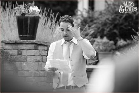 Woodlands B&B Wedding photographer outdoor speeches by marquee