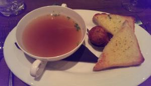 The lovely lobster consomme with some garlic toast and a tastylobster dumpling