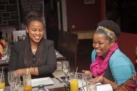 Anita Mogere and Njeri Ngugi share a light moment during the Always #LikeAGirl dinner