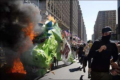 Once again, fire as a metaphor in the famous flaming green dragon of the 2004 RNC march